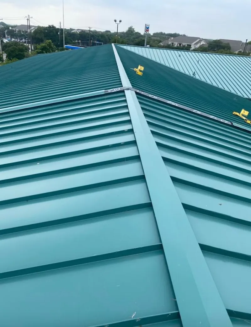 Green commercial metal roof ridge and valley for Metal Roof Repair in Donaldsonville